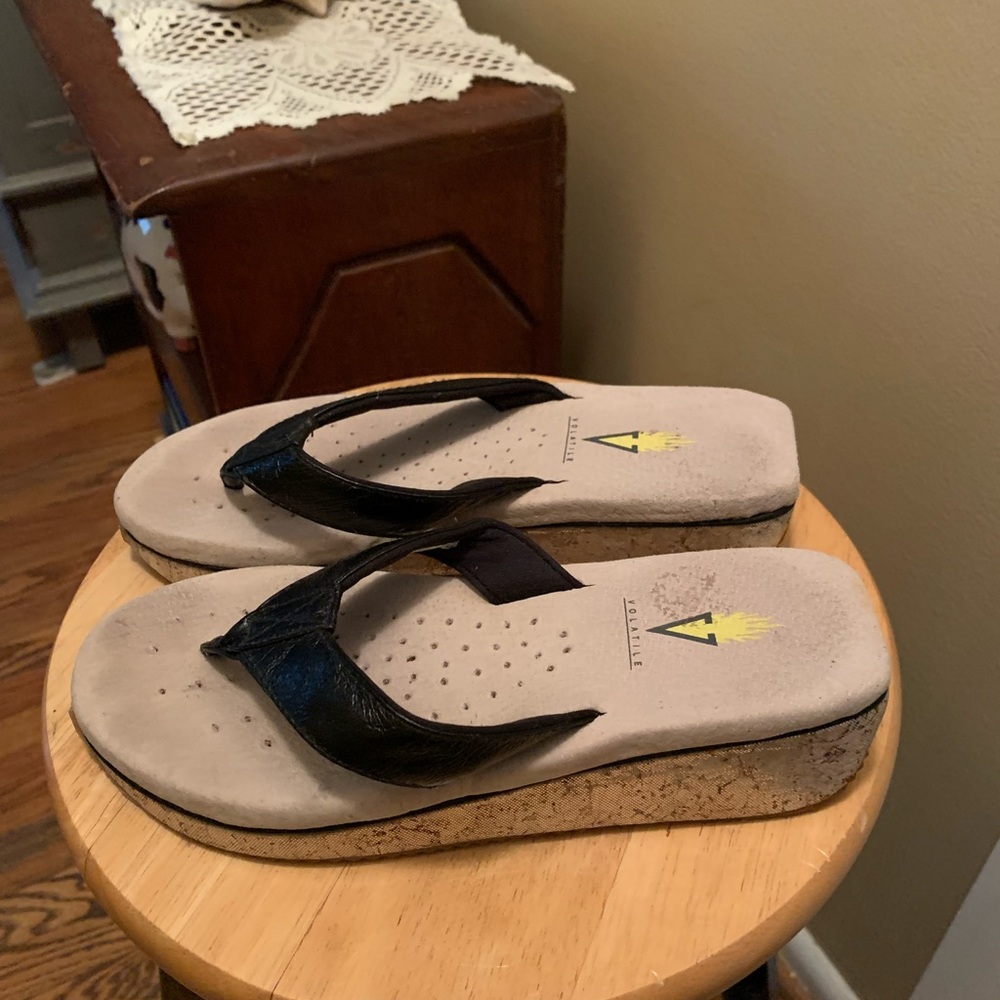 Volatile Black Woman’s Sandals